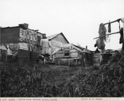 Eskimo woman outside of home Image