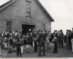 Distributing cookies and lemonade to the children of St Image