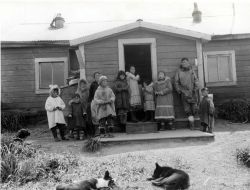 Eskimos at Paul Evanoff's house. Image