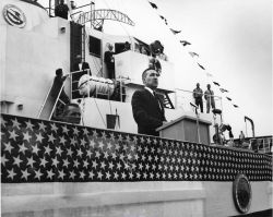 Secretary of Interior Stewart Udall speaking at dedication ceremony of ALBATROSS IV. Image