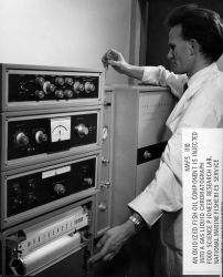 An oxidized fish oil component is injected into a gas liquid chromatograph at the Food Science Pioneer Laboratory. Image