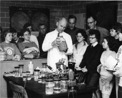 Fisheries scientist expounding to biology class from Geneseo State College Image