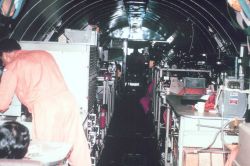 Interior of DC-6 looking forward. Image