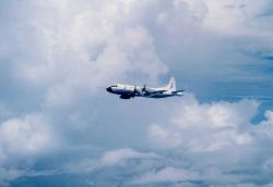 NOAA P-3 N43RF in flight Image