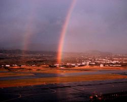 Double rainbow over an unknown airport. Image