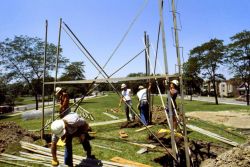 Attaching the first the first thirteen-foot section to the anchors. Image