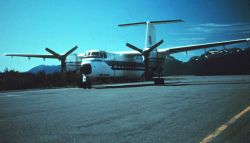 NOAA de Havilland Buffalo N13689 parked on tarmac. Image