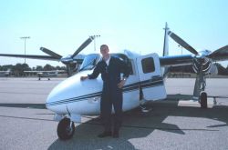 Aerial photographer Sean Linehan with the Rockwell Turbo Commander N53RF. Image