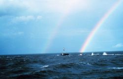 A double rainbow off the breakwater at the entrance to the Calcasieu River. Image
