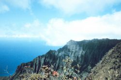 A knife-edge ridge trailing down to the sea. Image
