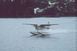 Float plane delivering parts for a heater Image