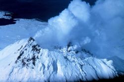 Snow and steam make an incongruous picture on Augustine Volcano. Image