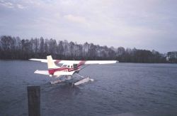 Seaplane taking off from the Tchefunte River to East Timbalier Island area. Image