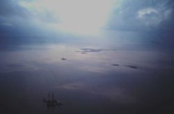 Dixon Bay well site - seen of a blow out and oil spill as seen from the air Image