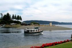Private boat leaving Gig Harbor for a day's cruising. Image