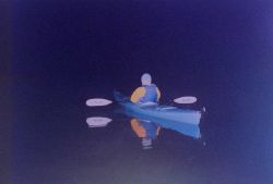 A night-time kayaker on the Patuxent River. Image