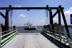 The Cedar Island to Ocracoke ferry boat CARTERET maneuvering to dock at Cedar Island. Photo