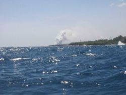 Lava flow entering the sea on SE coast of Hawaii. Image