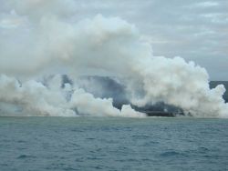 Lava flow entering the sea on SE coast of Hawaii. Image