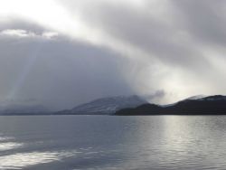 Light, sun, and clouds along the Inside Passage Image
