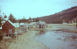 Town along a small tidal stream. Image