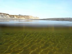 A rippled pond on Fossil Beach. Image