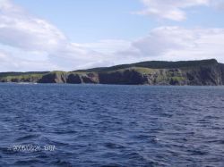 Cliffs along the shoreline of the Shumagin Islands. Image