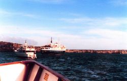 Cruise vessels anchored offshore. Image