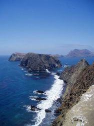 Looking west from East Anacapa Island along the sheer cliffs of the south side of the island. Image