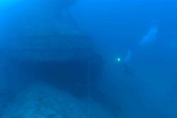 Divers on the shipwreck of the NORTHERN LIGHT at 190 feet. Image