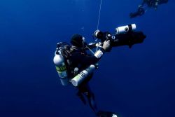 Diving archaeologist descending to the remains of the NORTHERN LIGHT. Image