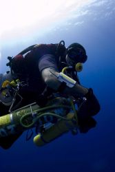 Diving archaeologist descending to the remains of the NORTHERN LIGHT. Image