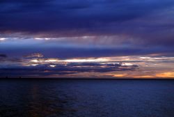 A spectacular sunset over the Santa Barbara Channel seen from Rincon Photo