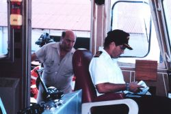Yeoman Chuck Gentilcore coming to inform Commanding Officer of NOAA Ship PEIRCE of problem while tied up at Nassau, Bahamas Islands. Image