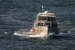 Launch approaching NOAA Ship THOMAS JEFFERSON for pickup. Image