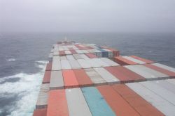 Looking over containers on the SEALAND COMMITMENT Image