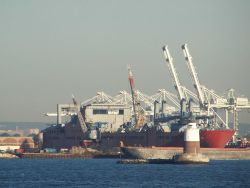 Large cargo ship at dock. Image