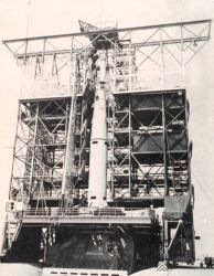Second stage of Thor-Able rocket being set in place prior to launching TIROS I Image
