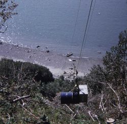 Bringing Shoran gear up a cliff for shore camp Image