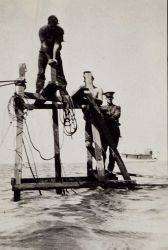 Erecting a portable tide gauge platform at Kettle Cove Image