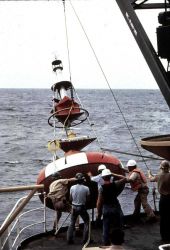 Deploying deep-ocean oceanographic buoy Image