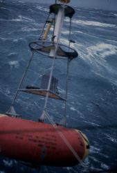 Deploying deep-sea oceanographic buoy in rough seas Image