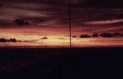 RESEARCHER bow in a blazing Pacific sunset. Photo