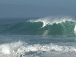 Huge surf with an offshore wind on Oahu's North Shore. Image