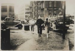 Walking down Ship Street after the waters receded Image