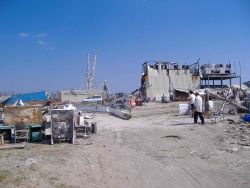 Damage to fish processing and preserving infrastructure. Image