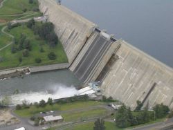 Waters roaring out of the outflow of the Friant Dam. Image