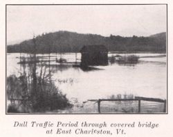 Dull traffic period through covered bridge at East Charleston, Vt. Image