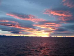 Sunset over Alaska Peninsula. Image