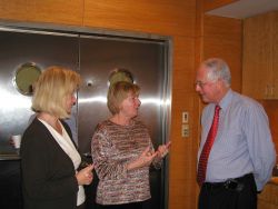 Linda Pikula, head of the NOAA Miami Regional Library, and Janice Beattie ( center), Director of the NOAA Central Library, speak with Dr Image